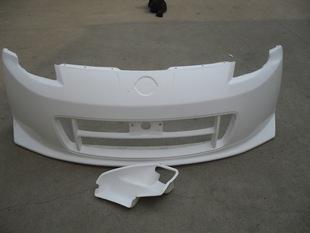 四柱液壓機(jī)壓制汽車保險(xiǎn)杠成品